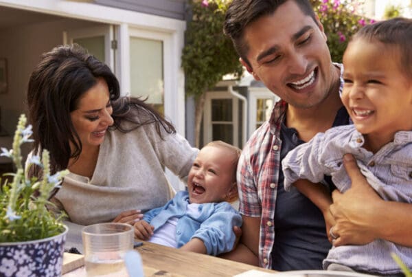 Custom-Landing-Page-Happy-Family-Eating-Outside-Their-Home-After-a-Fire